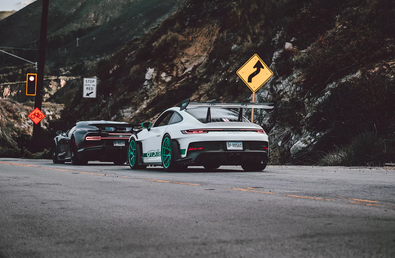 Fine art automotive photograph of a car on a winding mountain canyon road