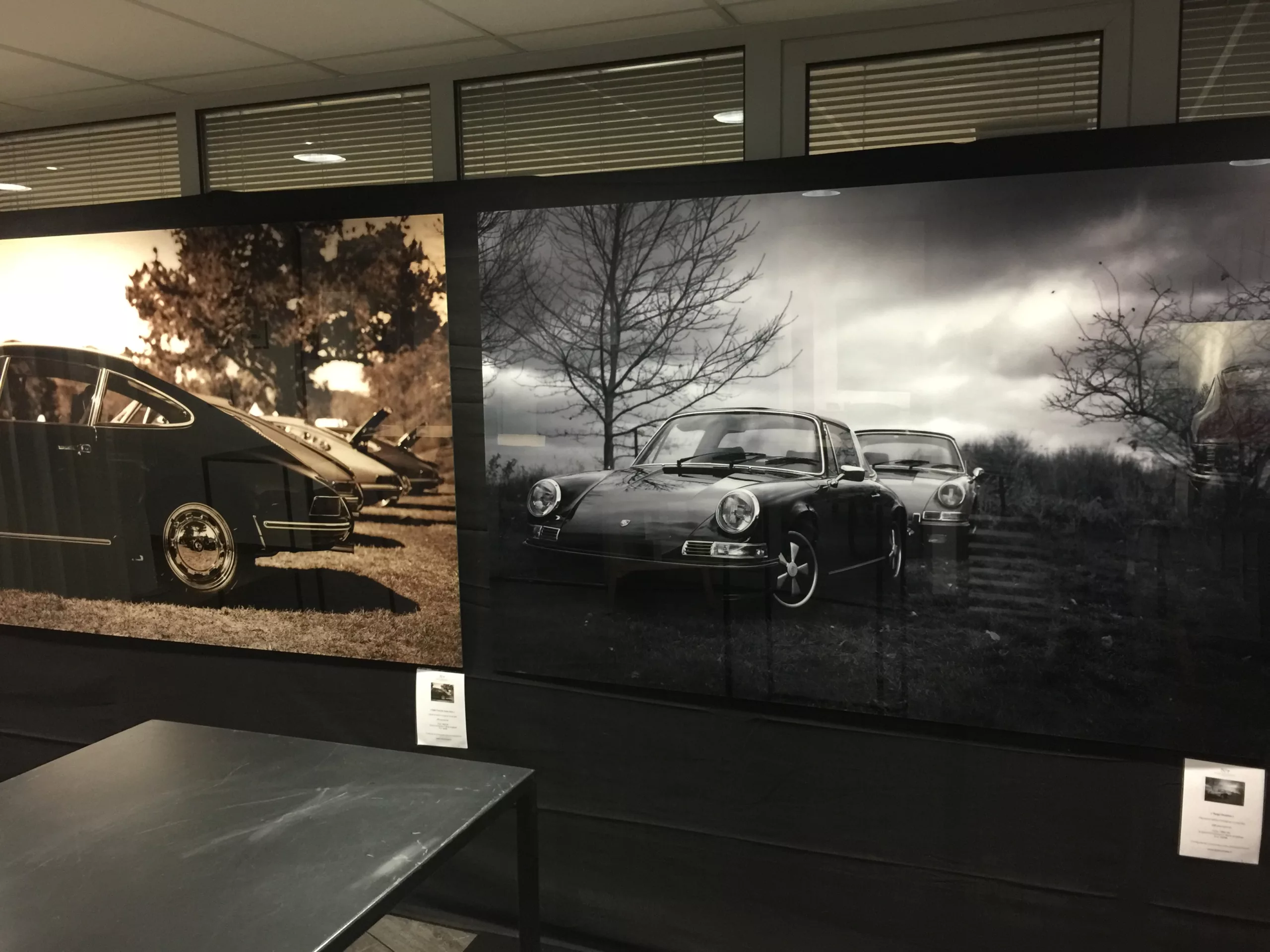 Framed black and white fine art print in a cozy, dim-lit room — Cars and Roses