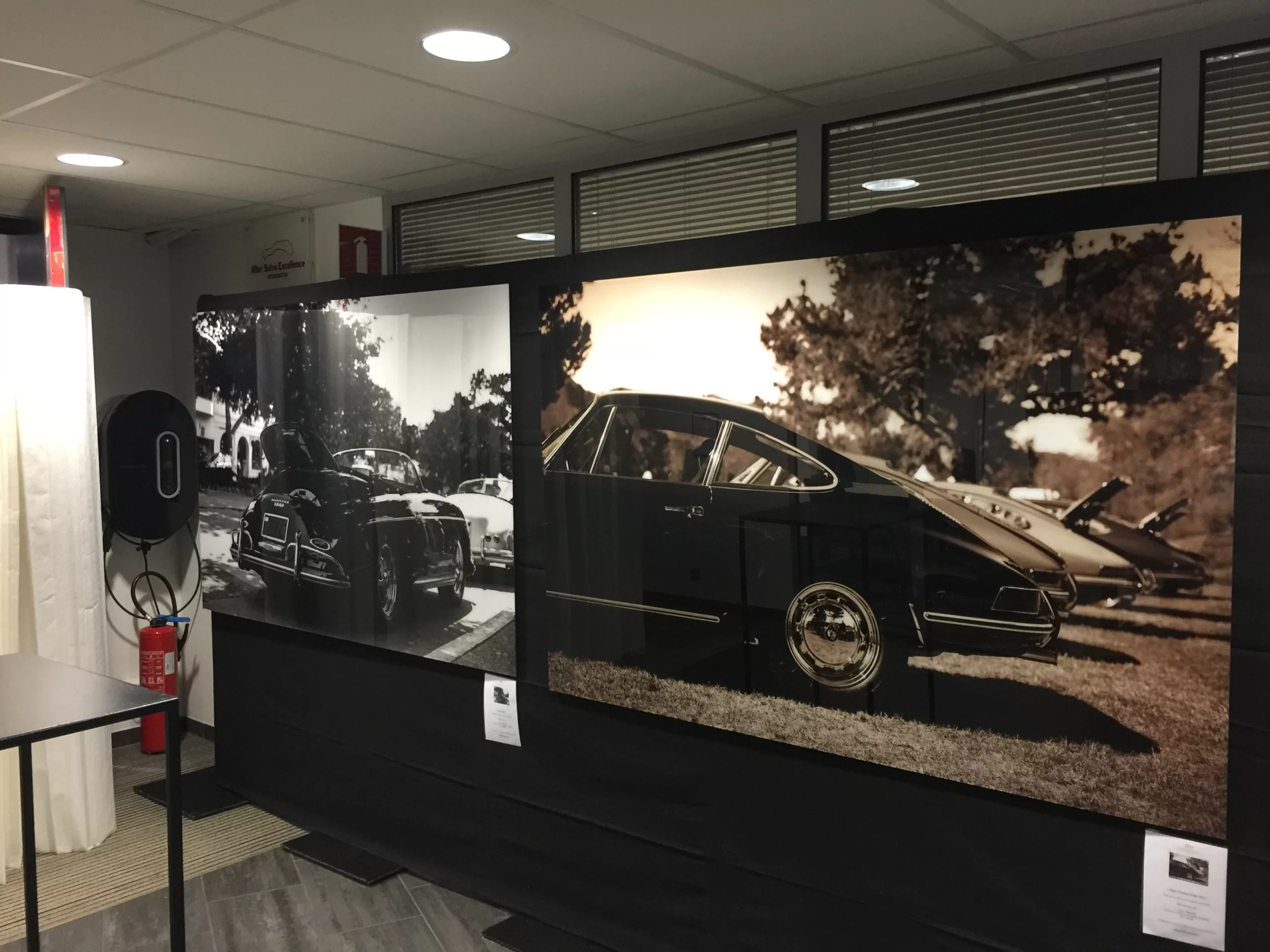 Fine art car photography prints installed in a showroom — Cars and Roses