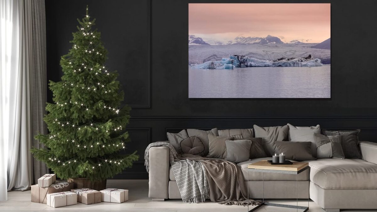 Fine art glacier landscape photography with pink hues displayed in an elegant living room with Christmas tree and festive decorations - Cars and Roses decorative print