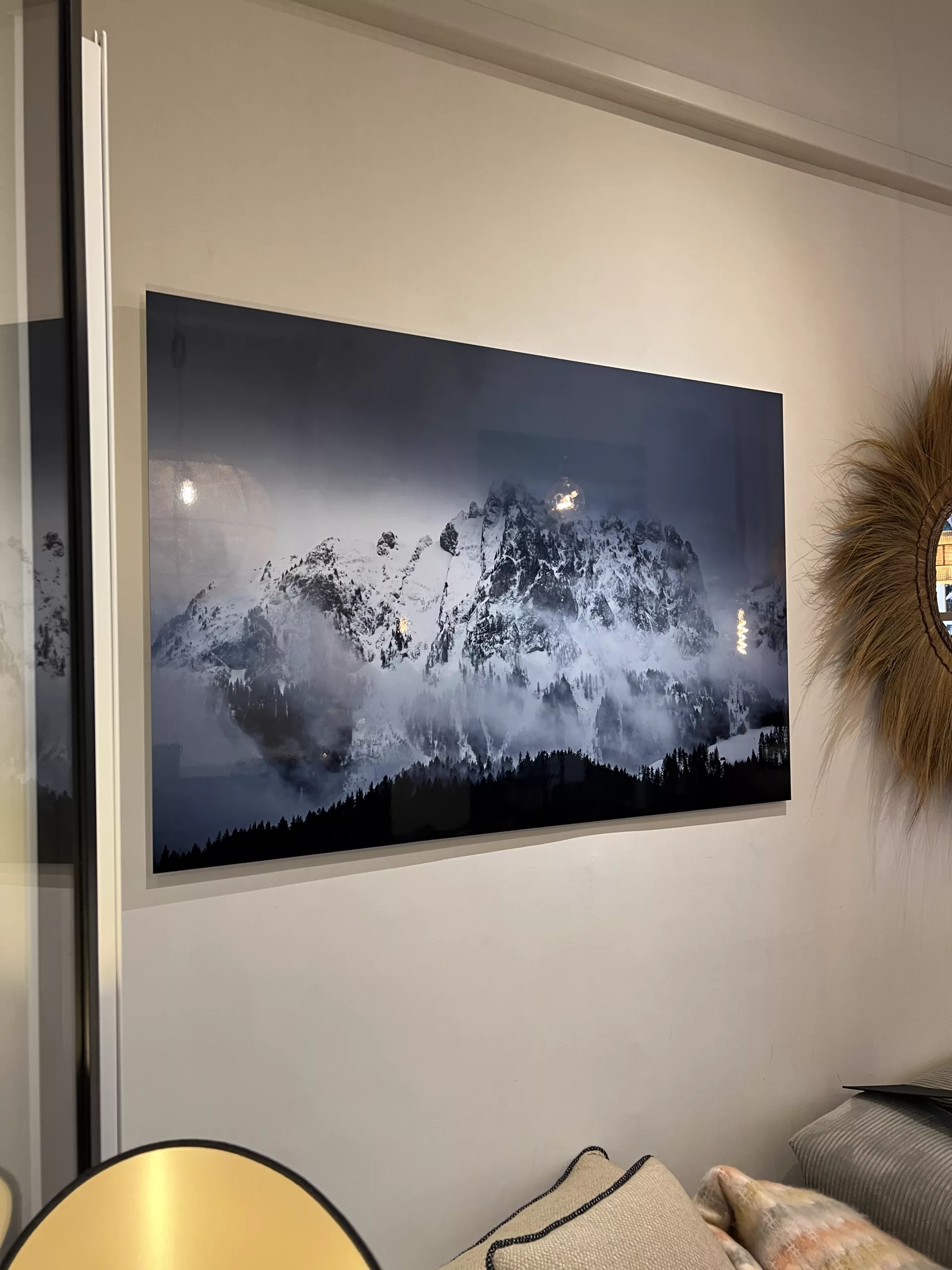 Large black and white fine art mountain landscape print installed on a white wall — Cars and Roses