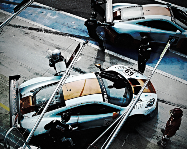 McLaren Mp4 Gulf moving in the Pit Lane