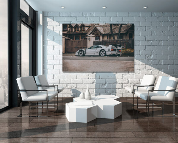 errari F40 grey art print displayed on large canvas in modern minimalist living room with white brick wall, contemporary furniture and natural lighting