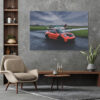 Photographs de la Porsche 911 GT3 RS – Énergie et Élégance Dynamic photograph of an orange Porsche 911 GT3 RS showcasing its aggressive aerodynamics, distinctive rear wing, and race-inspired design against a dramatic backdrop