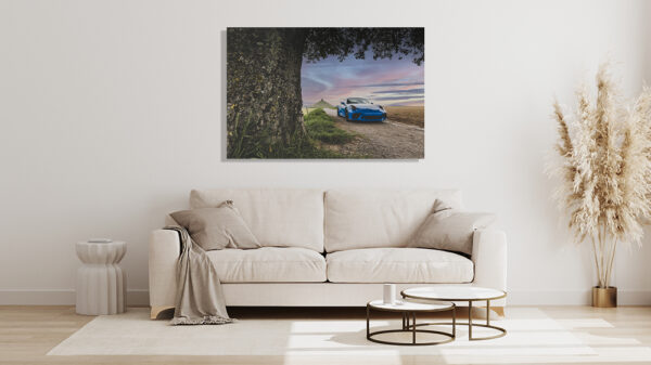 Stunning Porsche GT3 RS on a Serene Country Road Premium automotive photograph of a blue Porsche GT3 RS parked on a peaceful country road at dusk, framed by a majestic tree with rolling hills in the background