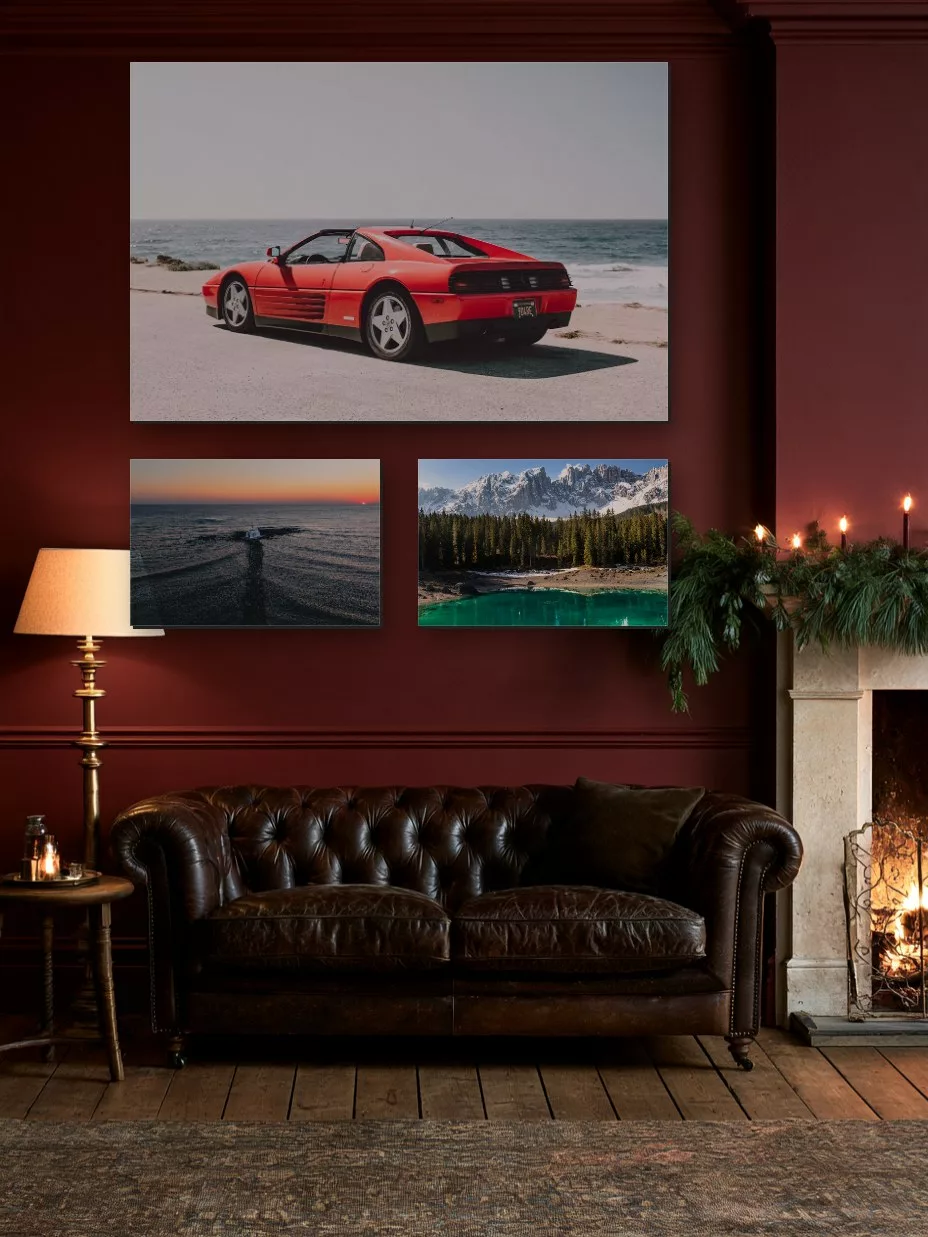 Christmas living room with three fine art prints on a burgundy wall