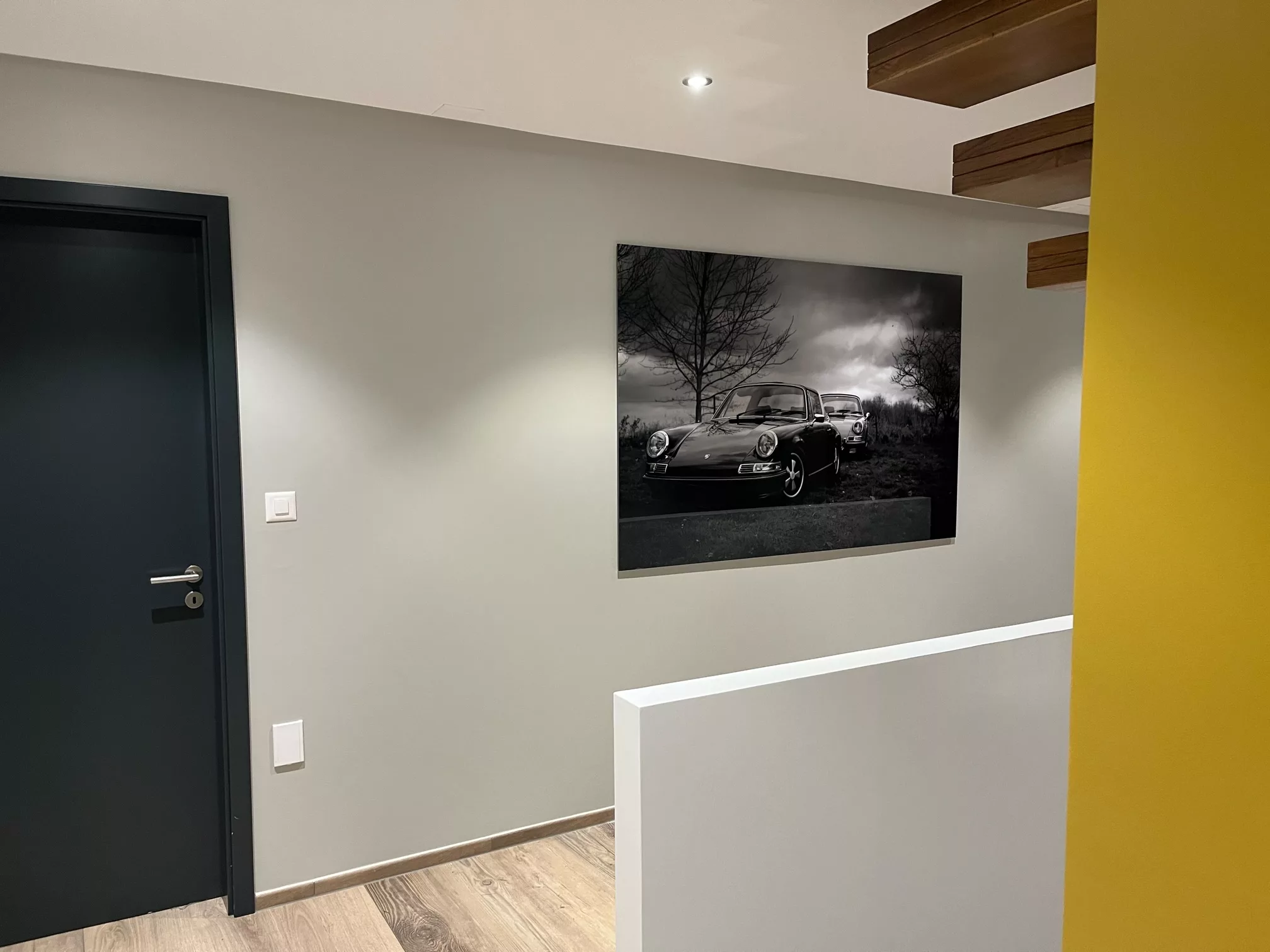 Framed fine art car photography print installed in a client's interior — Cars and Roses