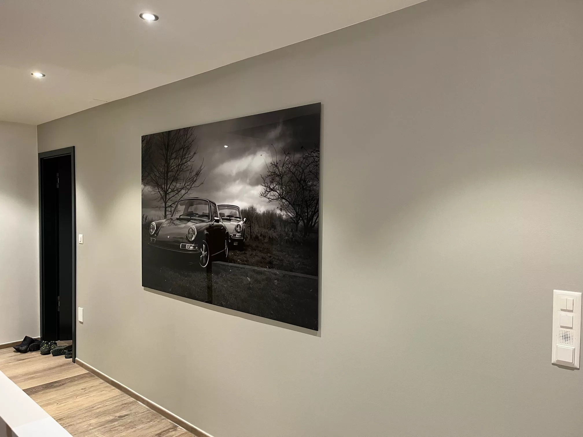 Framed fine art car photography print installed in a client's interior — Cars and Roses