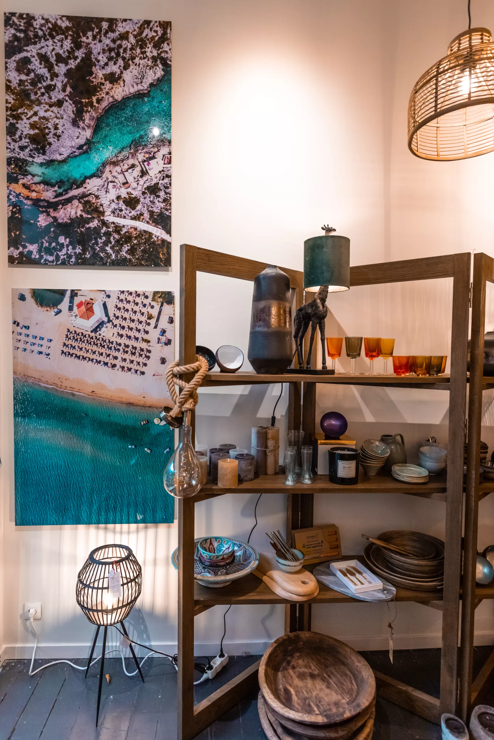 Cars and Roses production studio — fine art prints being framed on wooden shelves