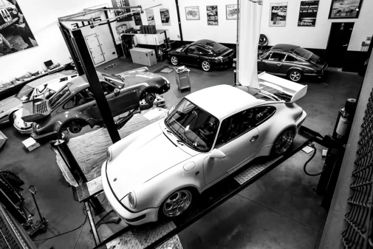 Porsche 911 in the workshop seen from above — black and white fine art photography limited edition print