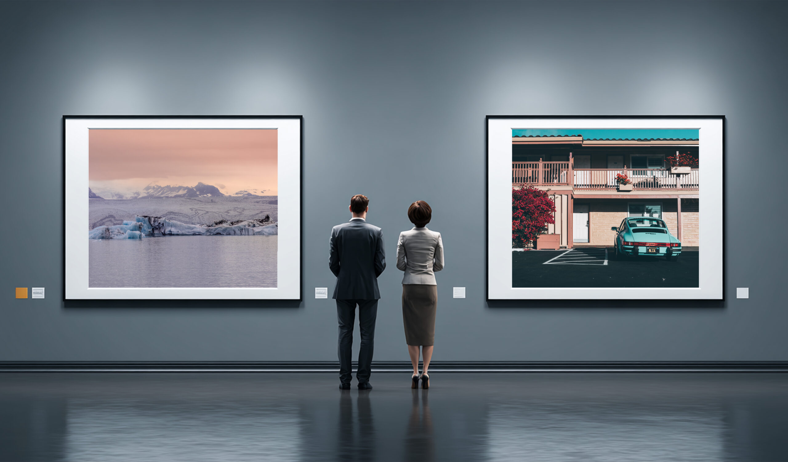 Two people stand before a gallery wall, facing large framed photographs: a snowy landscape on the left and a vintage car in front of a building on the right. They appear to be evaluating the pieces for a photo wall layout ideas.